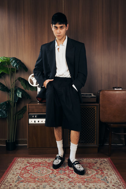 “La Vache” Noir Penny Loafers