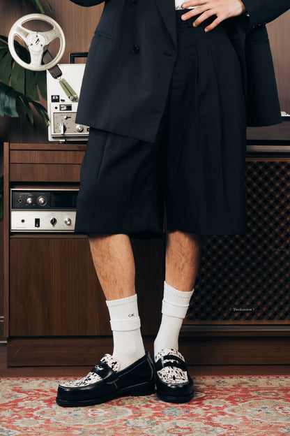 “La Vache” Noir Penny Loafers