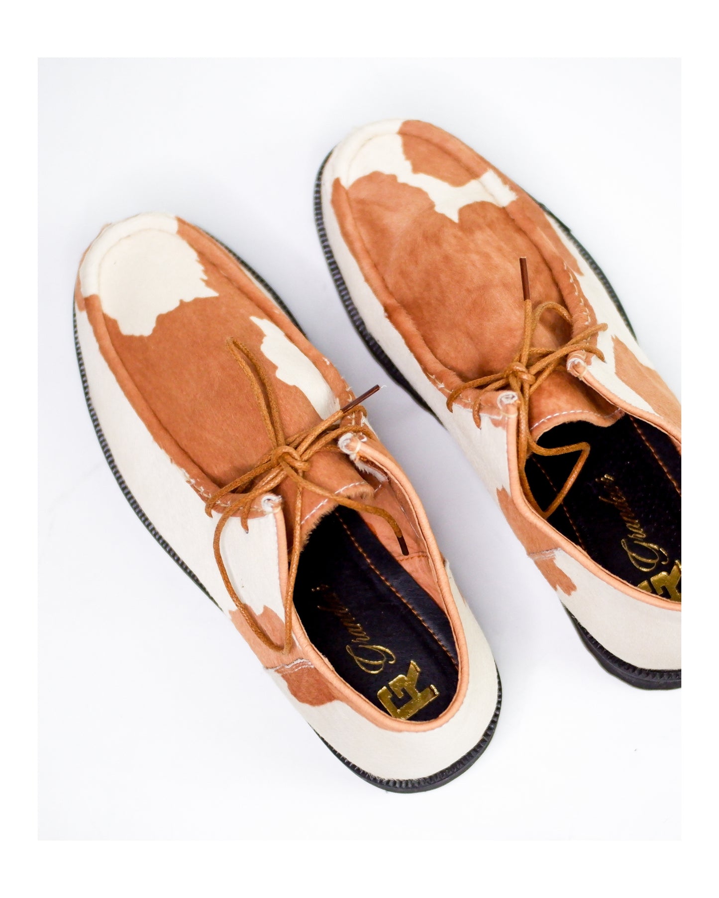“La Vache” Cow Print Derby Moc-Toe