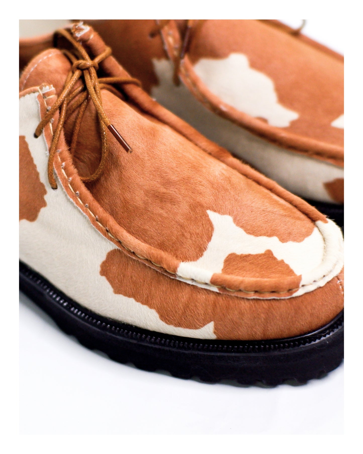 “La Vache” Cow Print Derby Moc-Toe