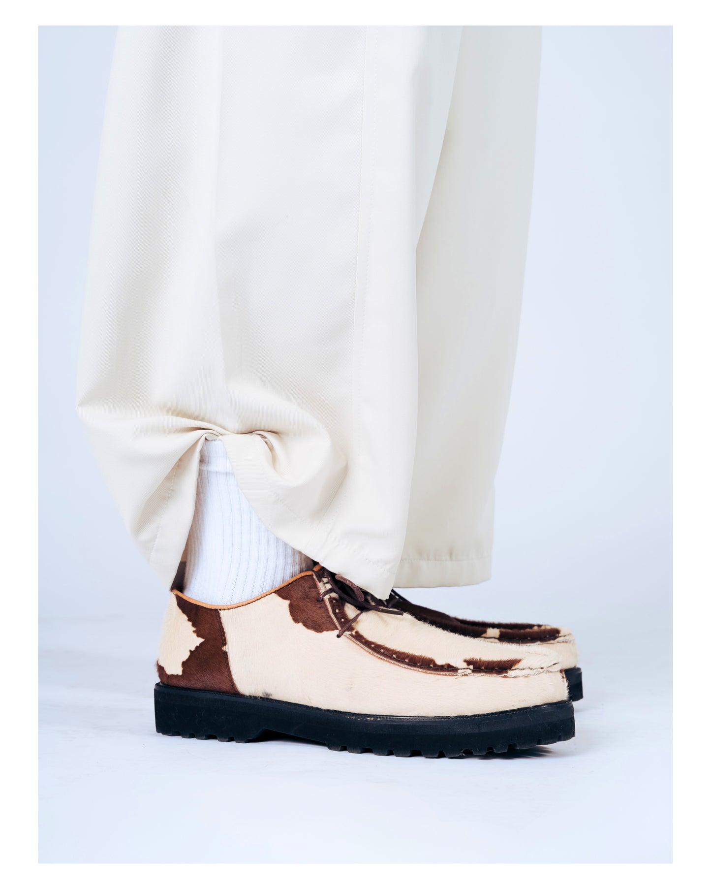 “La Vache” Cow Print Derby Moc-Toe