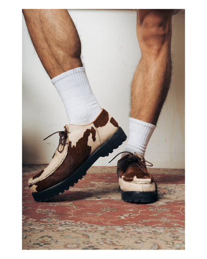 “La Vache” Cow Print Derby Moc-Toe