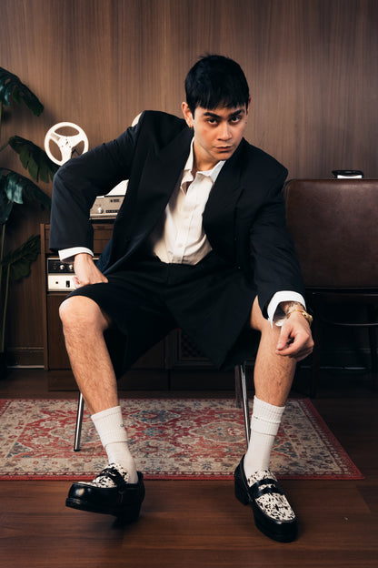 “La Vache” Noir Penny Loafers