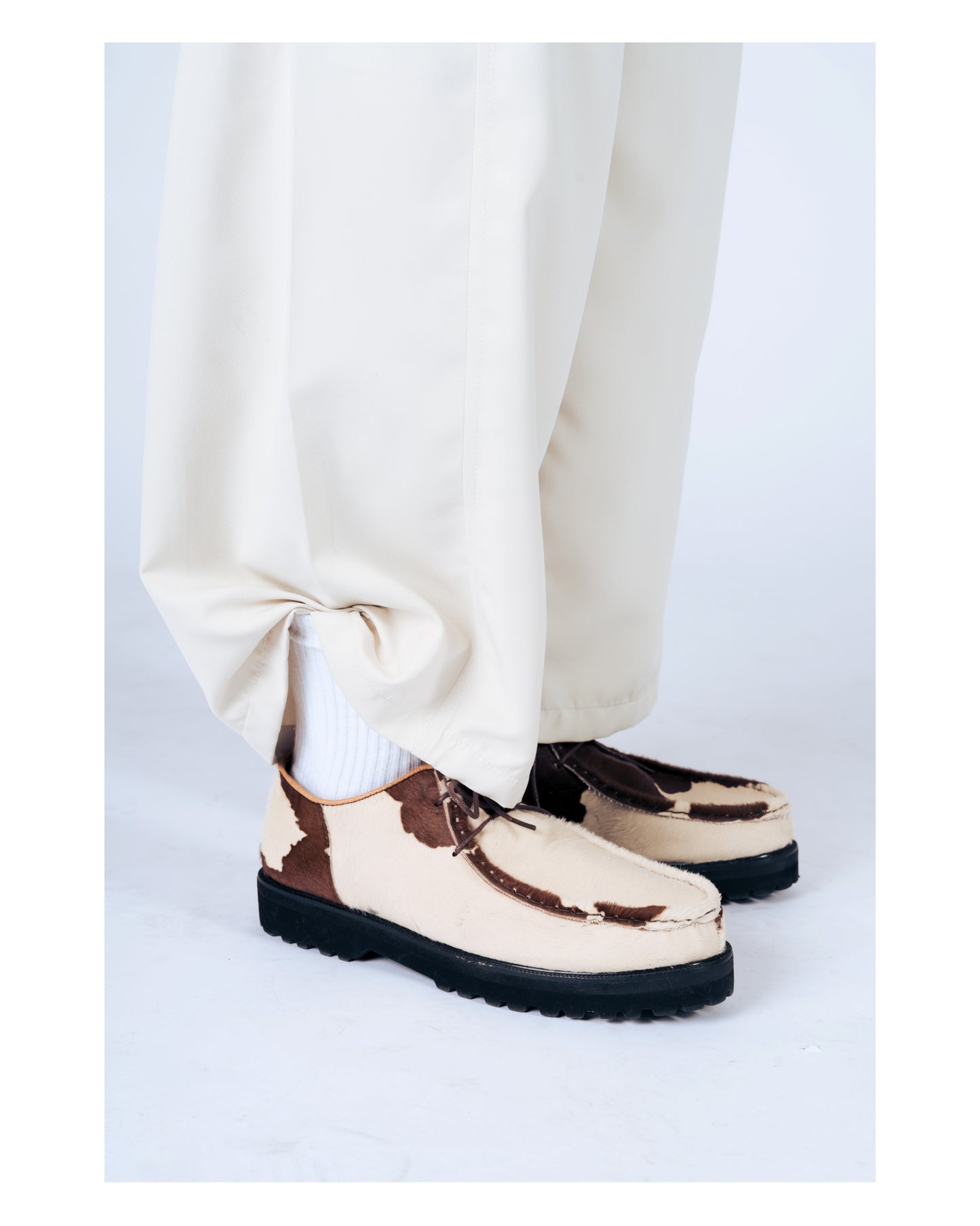 “La Vache” Cow Print Derby Moc-Toe