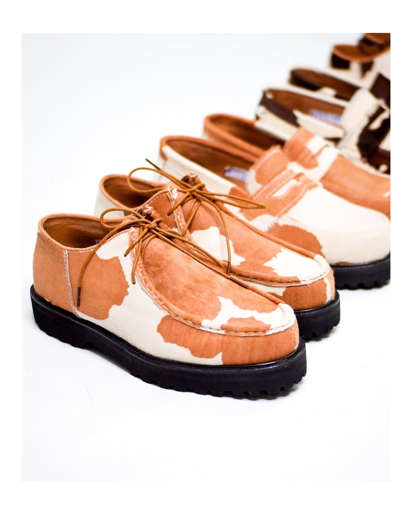 “La Vache” Cow Print Derby Moc-Toe