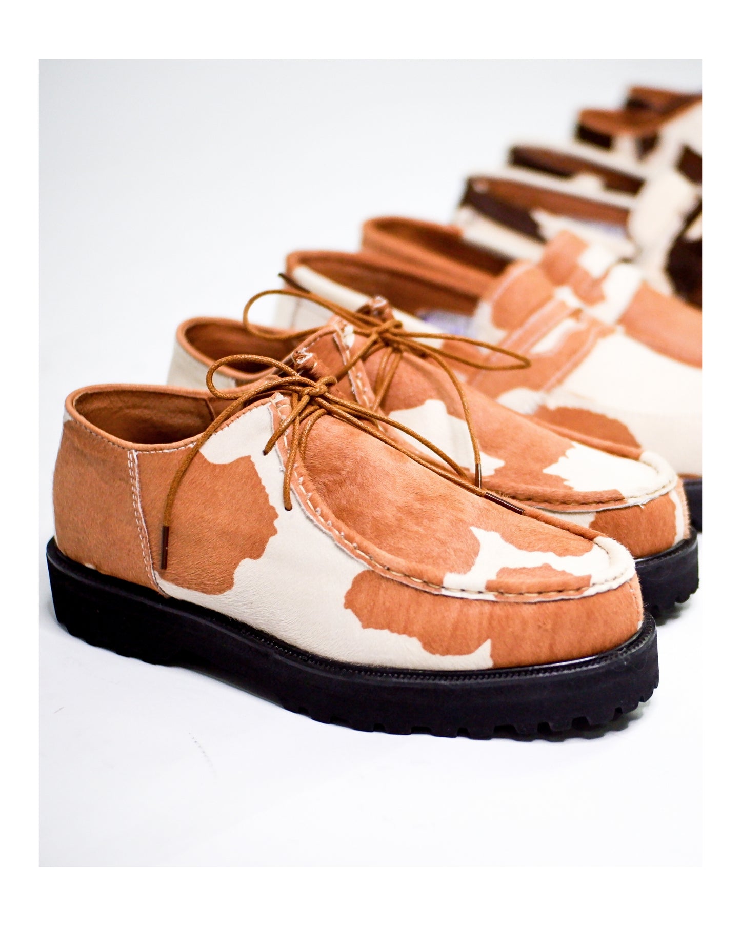 “La Vache” Cow Print Derby Moc-Toe